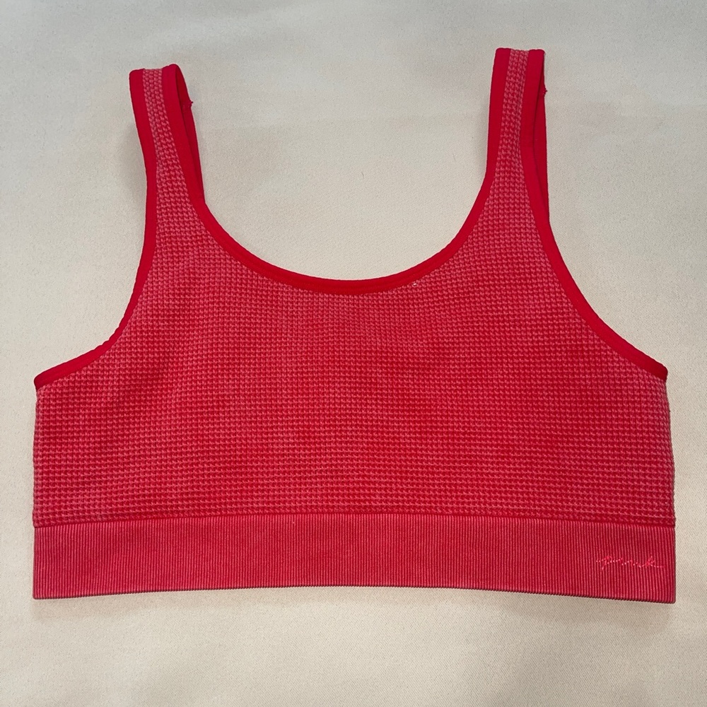 Red vs pink sports bra